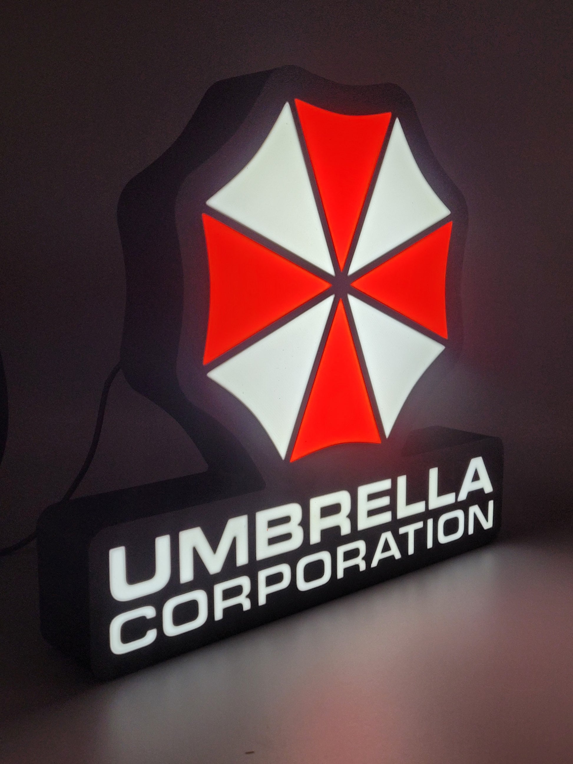 umbrella corporation led light sign with illuminated logo viewed from side view