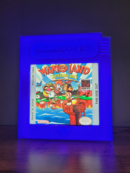 Wario Land GAMEBOY CARTRIDGE LED light sign with illuminated logo viewed from straight on