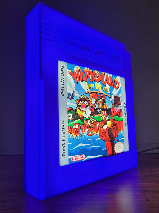 wario land giant cartridge led light sign with illuminated logo viewed from side view