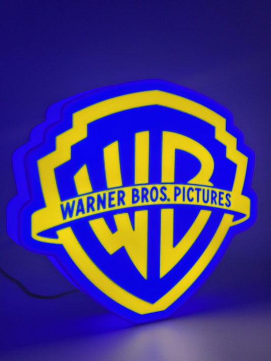 Warner Bros led light sign with illuminated logo viewed from side view