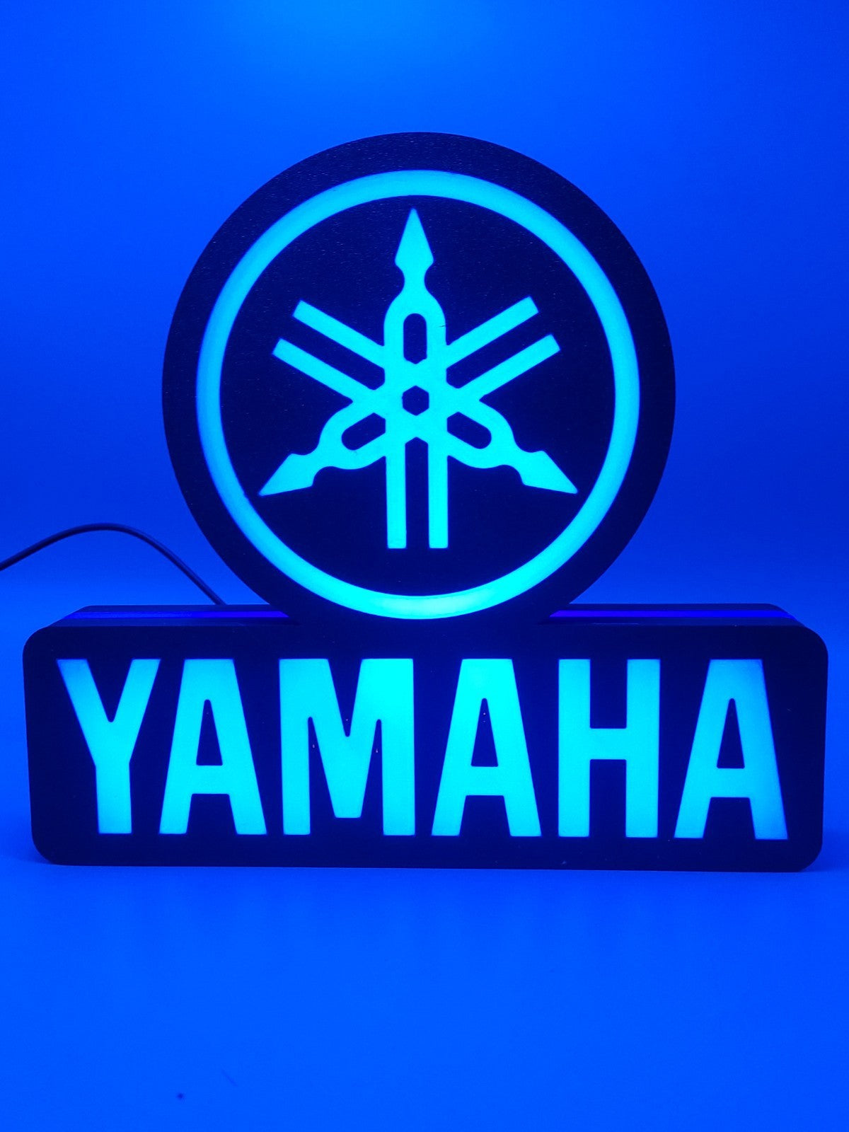 yamaha led light sign with illuminated logo viewed from side view