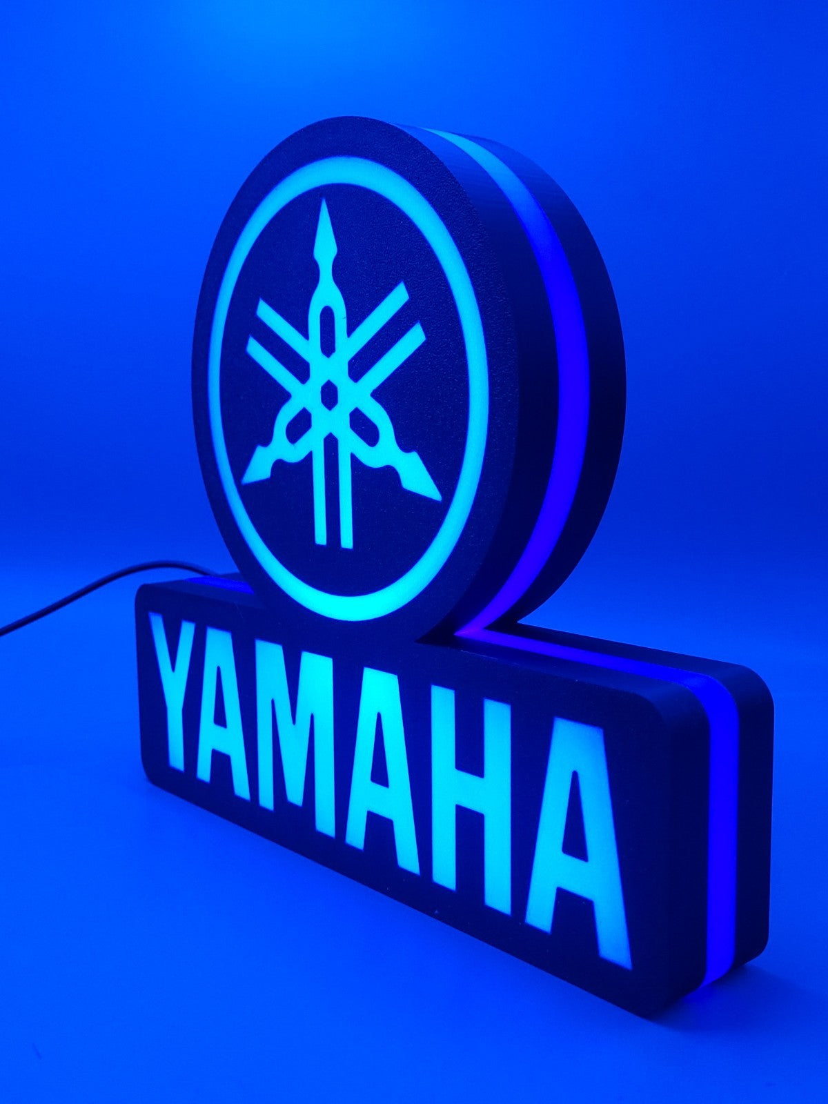 yamaha led light sign with illuminated logo viewed from side view