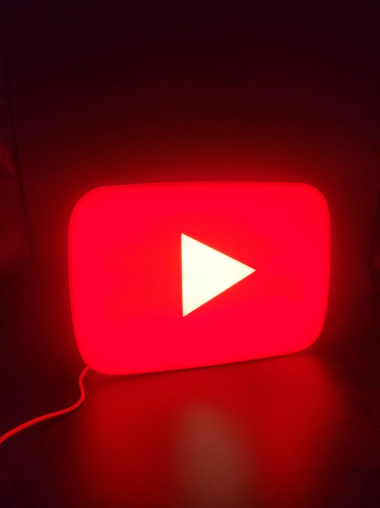 Youtube LED light sign with illuminated logo viewed from straight on